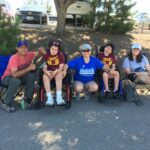 Anita Barraza two of her three kids ride wheelchairs