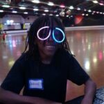 Jahrel wearing some fashionable glasses at a Bounce Bash(tm) skating event.