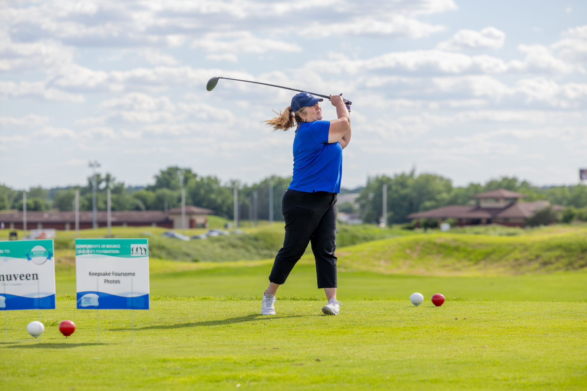 A golfer tees off at Birdies Fore Bounce 2026